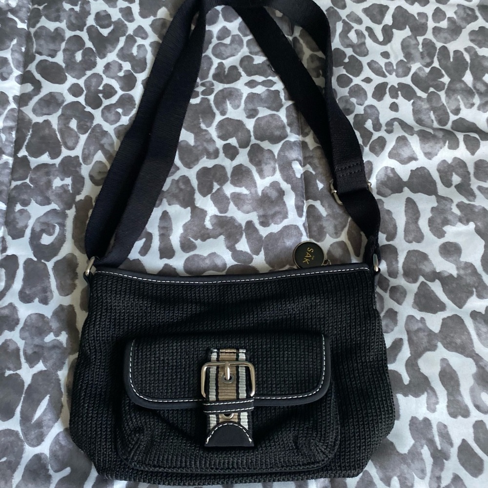 The Sak cross body black crochet, adjustable strap